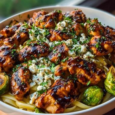 Hot Honey Balsamic Chicken Alfredo with Whipped Feta & Crispy Brussels Chips